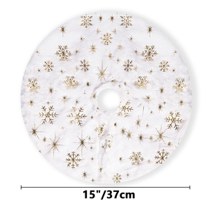 Detail view of a 15-inch white plush Christmas tree skirt with gold snowflake patterns