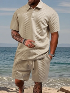 Detail of beige summer polo set showing textured knit fabric and relaxed beach style