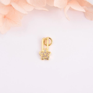 Gold star pendant with micro-inset zircons for DIY jewelry making on white background