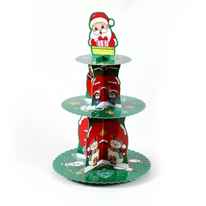 Three-tier Christmas cardboard cupcake stand with Santa and penguin holiday illustrations