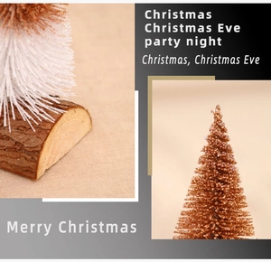 Macro detail of rose gold glitter Christmas tree with frosted branches and wood base