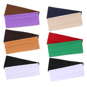 Macro shot of multi-color elastic sports headbands in soft breathable knitted fabric