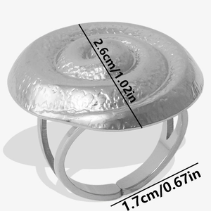 Detail view of silver spiral ring with dimensions of 2.6cm top disc and adjustable band