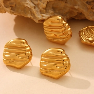 Irregular textured gold earrings with polished wavy surface and 18K gold plating