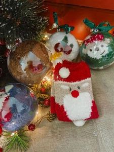 Christmas coral fleece socks with 3D cartoon dolls in a clear festive gift ball package