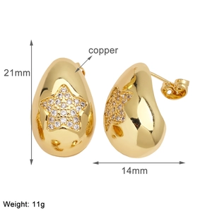 Detailed view of gold plated teardrop earrings with zircon stars measuring 21mm by 14mm