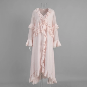 Close-up of light pink maxi dress featuring V-neckline and layered ruffle details