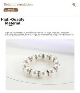Close-up of elegant faux pearl napkin ring with crystal-encrusted silver spacers