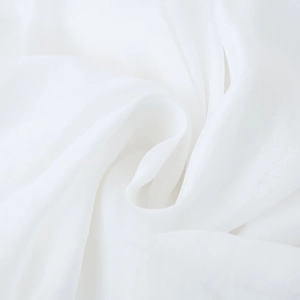 Sexy white backless mini dress in soft silky fabric with smooth texture and high drape