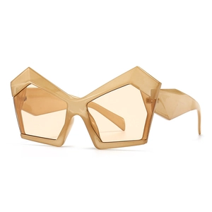 Fashionable oversized irregular geometric sunglasses in transparent champagne amber finish