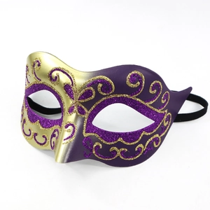Elegant purple and gold gradient masquerade mask with intricate glitter floral patterns