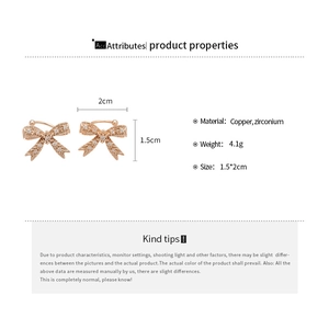 Dettagli dimensionali per orecchini a clip a fiocco in oro rosa con zirconi e base in rame