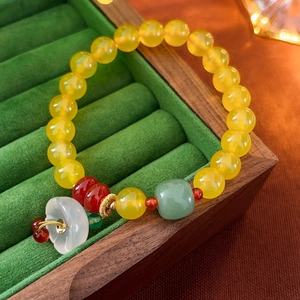 New Chinese style beaded bracelet with yellow chalcedony and white flower pendant