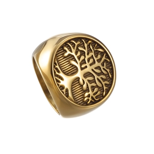 Detailed view of the tree of life engraving on a polished gold stainless steel signet ring