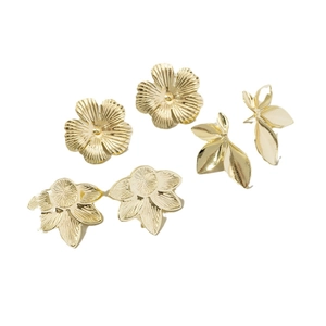 Three-set gold flower and leaf stud earrings with brushed metallic texture for women