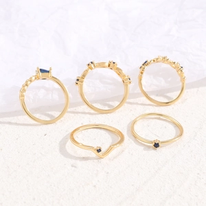 Five-piece vintage gold alloy ring set for women featuring elegant navy blue gemstones