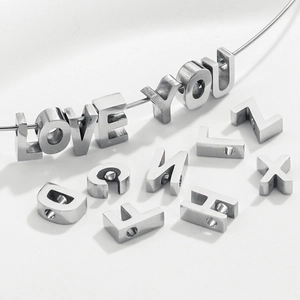 Polished stainless steel letter pendants forming LOVE YOU on string with scattered beads