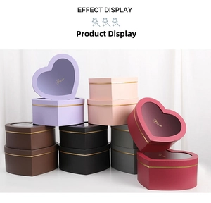 Detail of heart-shaped nested gift boxes with transparent windows and gold Rose foil