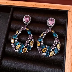 Vintage teardrop earrings with colorful stones and silver needles in black velvet box