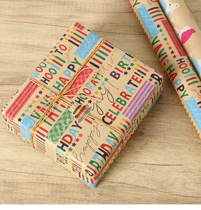 Brown kraft birthday wrapping paper with colorful artistic font and jute twine detail