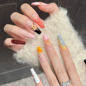 Floral press-on nails in coffin shape with 3D water drops and marble art patterns