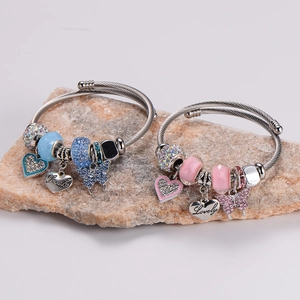 Adjustable stainless steel charm bracelet with heart, butterfly and crystal beads