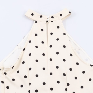 Robe longue à pois sans manches avec col licou et détails de boutons au dos
