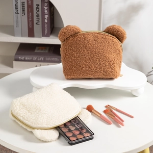 Teddy bear ear plush makeup bags in brown and beige colors with gold zipper closure
