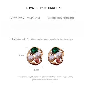Detail view of retro alloy earrings with rhinestones showing weight and 2.5cm size