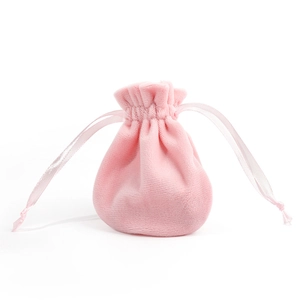 Pink velvet drawstring jewelry pouch for accessories storage and travel organization