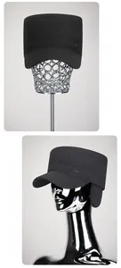 Detail of grey wool blend flat top cap with foldable earflaps and sport metal logo