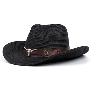 Detail of black woven cowboy hat with brown leather band and silver bull head ornament
