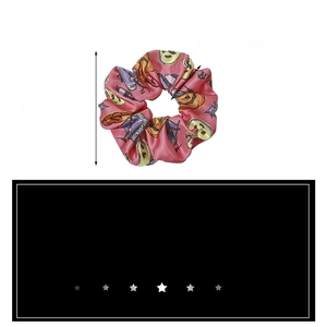 Pink Halloween scrunchie detail with pumpkin and bat prints and product measurements