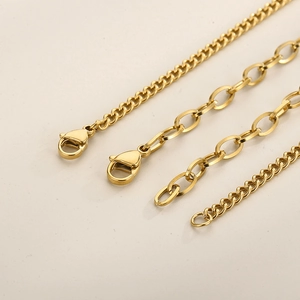 Macro shot of assorted golden metal curb and link chains for DIY jewelry making