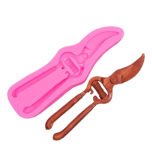 Stampo in silicone rosa per pinze e cesoie, ideale per torte in pasta di zucchero o cioccolato