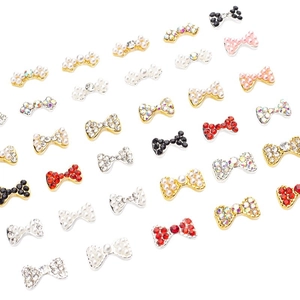 Lot de breloques nœuds pour nail art en alliage avec perles et strass colorés