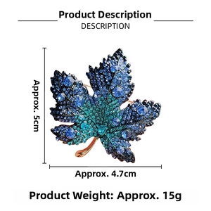 Macro shot of maple leaf brooch with blue gradient rhinestones and dimensions