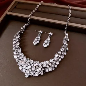 Elegant silver rhinstone jewelry set with tassel necklace and geometric earrings