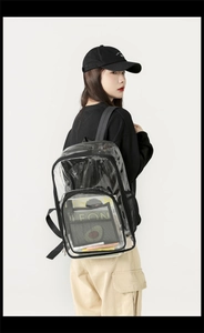 Macro detail of waterproof transparent PVC backpack with black trim and front pocket