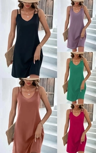 Detail view of a V-neck strapless summer dress available in five vibrant colors