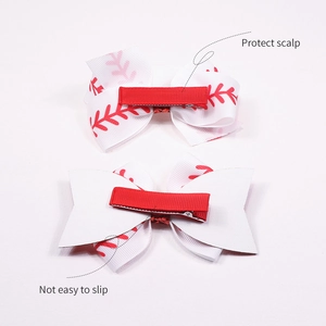 Red baseball print bow hair clips with glitter details and non-slip alligator grips
