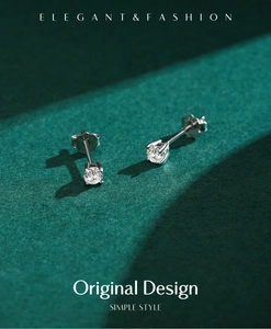 Macro detail of S925 sterling silver stamp on moissanite stud earring with claw setting