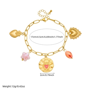 Gold plated stainless steel charm bracelet with pink flowers and sacred heart charms