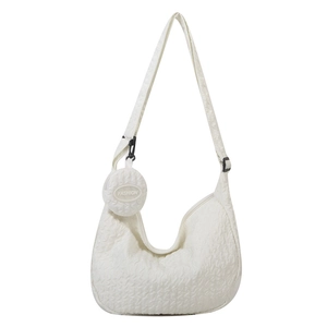 White puffy cloud crossbody bag with textured fabric and a small round fashion coin purse