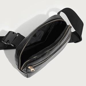 Black lychee texture waist bag with adjustable strap and dual golden zippers detail