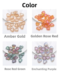 Macro detail of heart-shaped crystal beads in golden amber, rose, and purple finishes