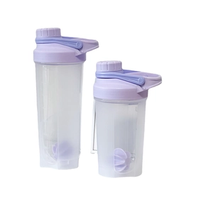 Set of two light purple fitness shaker bottles with scale markings and mixing balls