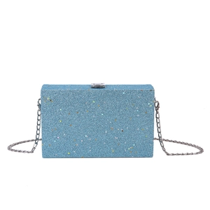 Blue glitter box evening bag with colorful stars and silver chain shoulder strap