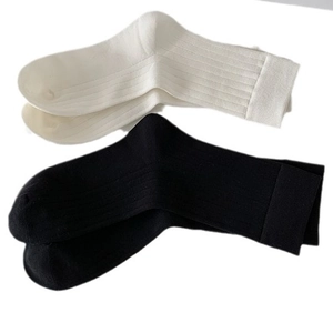 Breathable cotton crew socks in black and white ribbed knit for women