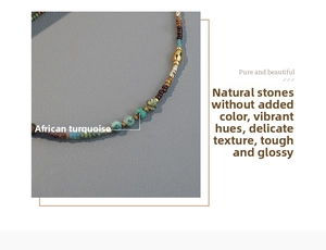 Detail of handmade beaded necklace with turquoise stones and golden metal beads